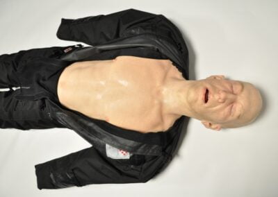 Life-like medical mannequin for emergency training.