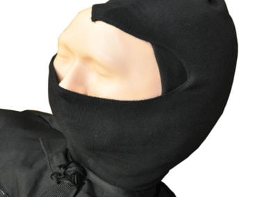 Close-up of a mannequin wearing a black ski mask.