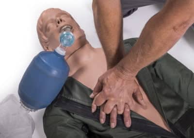 CPR training on a dummy with manual resuscitator.