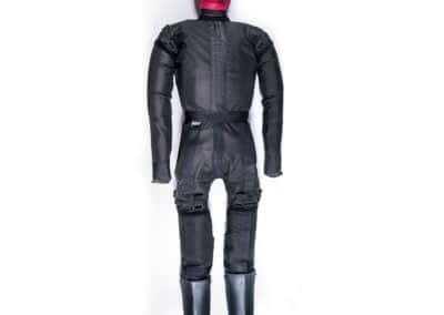 Training dummy in black suit with red head covering.