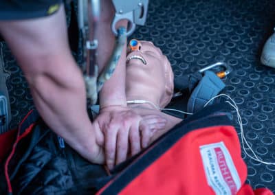 First aid CPR training on a mannequin.